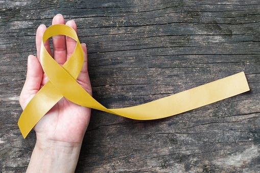 Yellow ribbon a symbol of suicide prevention. (Getty Images)