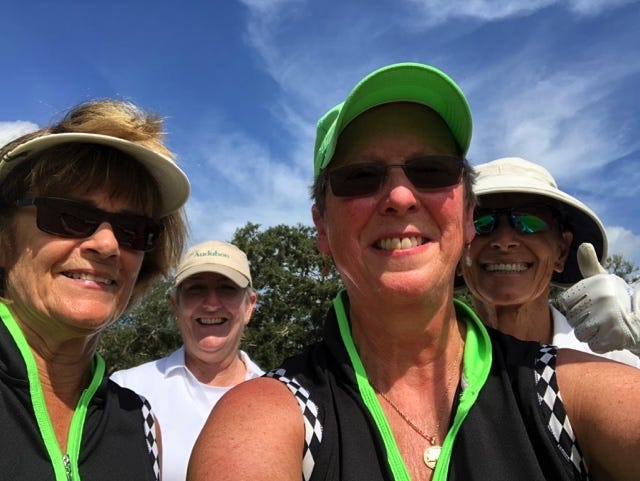 BJ Mott, right, had a hole in one on Grand Haven's 14th hole during the club's annual women's member/member tournament last week. I4. With her, from left, are Lynn Lefler, Sara Lockhart and Kaye Boyer-Ryan. [Photo provided]