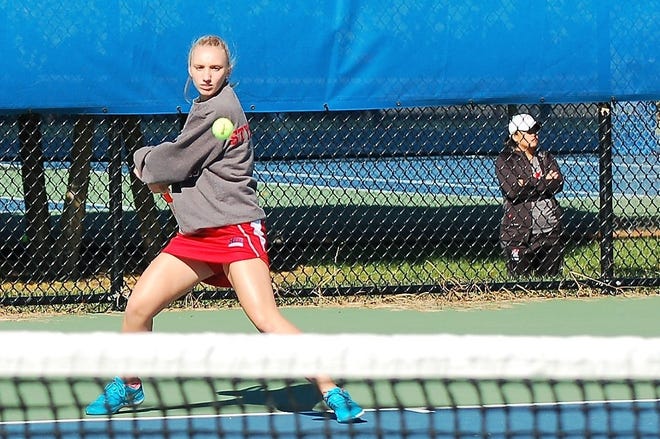 Moorestown Friends No. 3 singles player Elena Styliades concentrates on her backhand during the NJSIAA Nonpublic B championship Thursday. [TOM RIMBACK / STAFF PHOTOJOURNALIST]