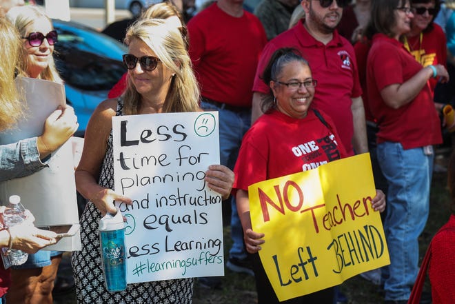 Volusia County school teachers rally for better pay and working conditions before the start of Tuesday's School Board meeting in DeLand on Tuesday, May 8, 2018. [News-Journal/Lola Gomez]