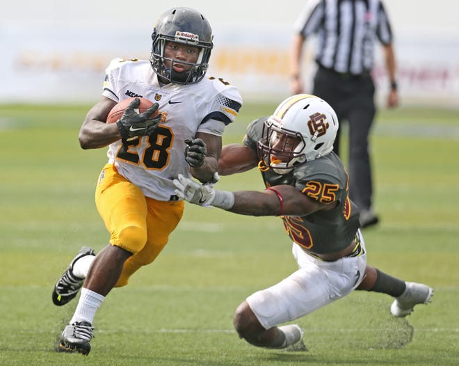 Before taking the NFL by storm, North Carolina A&T's Tarik Cohen (28) was a problem for B-CU and other MEAC defenses. [News-Journal/NIGEL COOK]