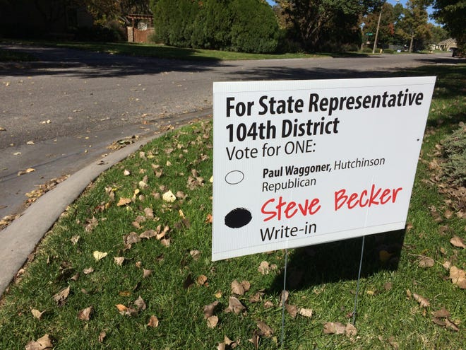 Yard signs that show how to write in Steve Becker’s name on the Nov. 6 ballot were printed by Ron Sellers, a Hutchinson Republican running unopposed for the Reno County Commission. [Mary Clarkin/HutchNews]