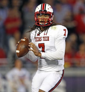 Texas Tech's Jett Duffey (7) looks to pass the ball during the first half of a Big 12 Conference game back on Oct. 11 against TCU at Amon G. Carter Stadium in Fort Worth. Duffey was bad enough in the first half to be benched at halftime, then had to return, whereupon he made his mark with big plays: 62- and 57-yard passes and a 38-yard touchdown run that proved to be the game winner. [Brad Tollefson/A-J Media]