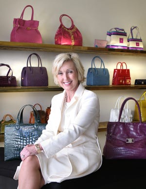 Luxury handbag designer Lana Marks photographed at her store on Worth Ave. in in 2009. [Tim Stepien / Palm Beach Daily News]