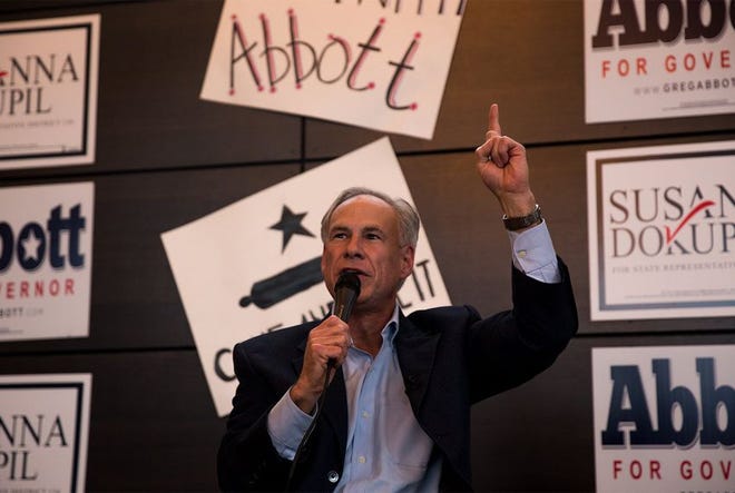 Gov. Greg Abbott speaks at a get out the vote rally in Houston on Tuesday, Feb. 20, 2018, the first day of early voting for Republican and Democratic primaries in Texas.
