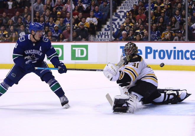 Vancover's Bo Horvat beats Jaroslav Halak for the game-winning goal on Saturday night. The Bruins wrap up their road trip in Ottawa on Tuesday night.
