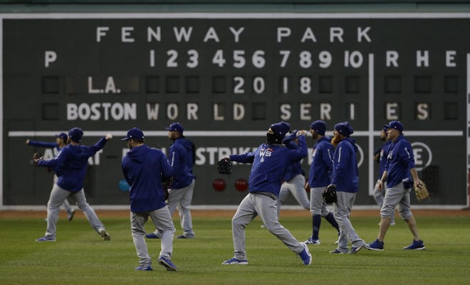 Los Angeles Dodgers' players practice for Game 1 of the World Series against the Boston Red Sox on Monday in Boston. [The Associated Press / Matt Slocum]