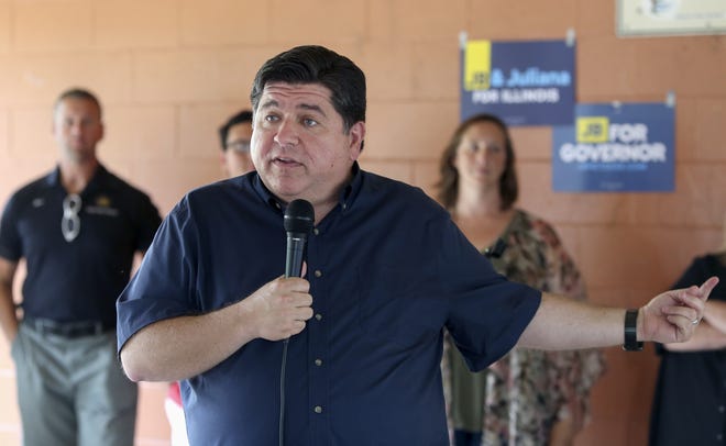 In this July 29, 2018, photo, Illinois Democratic governor candidate J.B. Pritzker talks with supporters in Geneva, Ill. New Illinois campaign reports show that Pritzker has pumped $146.5 million of his own money into his bid to unseat Republican Gov. Bruce Rauner. (AP Photo/Teresa Crawford)