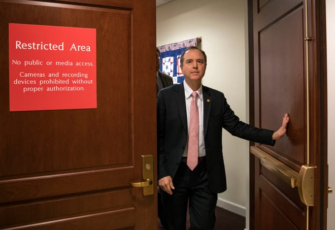 FILE - In this March 22, 2018 file photo, Rep. Adam Schiff, D-Calif., ranking member of the House Intelligence Committee, exits a secure area to speak to reporters, on Capitol Hill in Washington. House Democrats are expected to re-open the investigation into Russian interference in the 2016 election if they win the majority in the November midterms, but they would have to be selective in what they investigate. (AP Photo/J. Scott Applewhite)