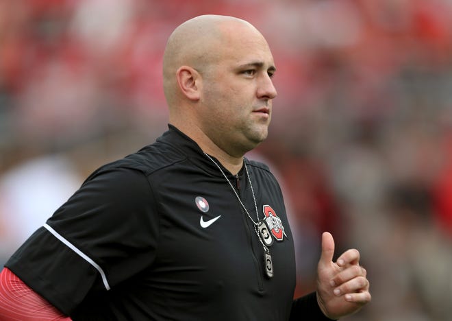 Ohio State assistant coach Zach Smith watches before the start of an NCAA college football game against Army in Columbus in 2017.