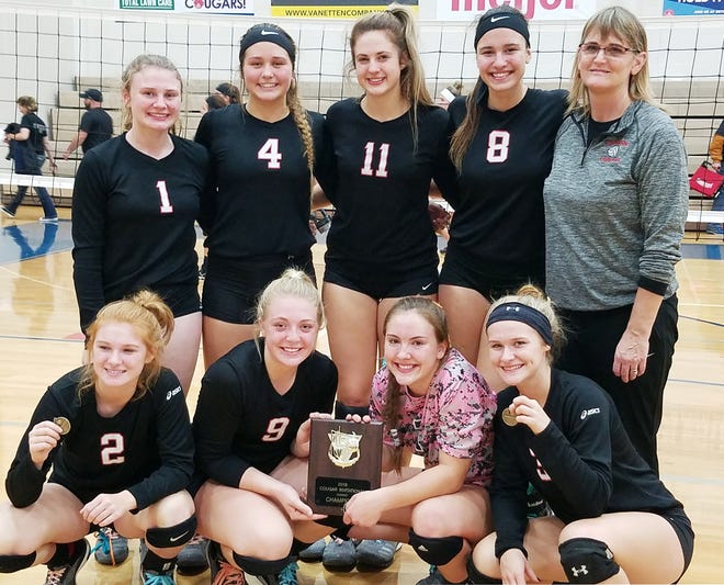 C-F poses with its trophy after winning the Lenawee Christian Invite. (COURTESY PHOTO)