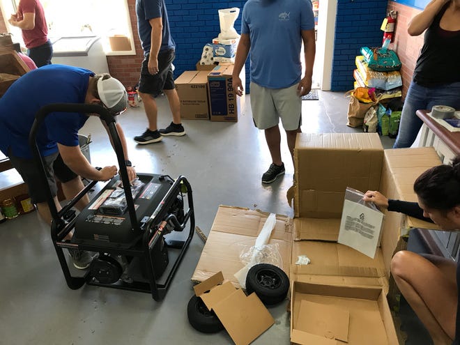 Preserving South Walton volunteers visit Cavern's Learning Center in Marianna to help unload supplies. [CONTRIBUTED PHOTO]