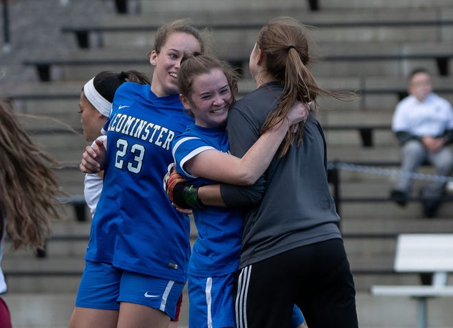 Members of the Leominster High School girls’ soccer team celebrate after their 3-0 win over Shepherd Hill on Saturday, Oct. 20, Homecoming Day. [MELONY LETARTE PHOTO]