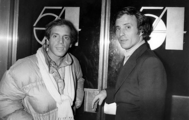 Steve Rubell, left, and Ian Schrager outside Studio 54. [Zeitgeist Films]