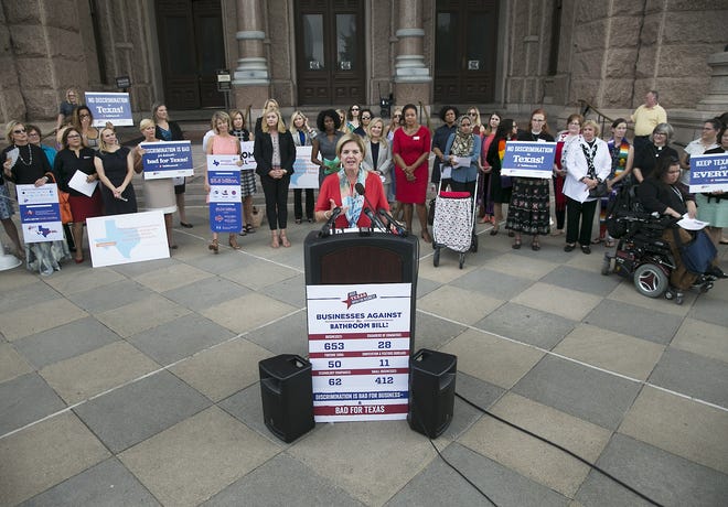 Jennifer Davis, Dell Technologies' vice president for operations and global client solutions communications, speaks on the south steps of the Texas Capitol on Aug. 8, 2017, to urge lawmakers to reject the "bathroom bills" proposed during the legislative session.

[RALPH BARRERA/AMERICAN-STATESMAN]