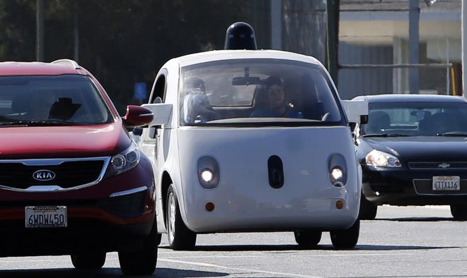A Google self-driving car travels the roads. The group Save Driving aims at preserving human driving and keeping the car culture alive for future generations. [Bay Area News Group via TNS / Karl Mondon]