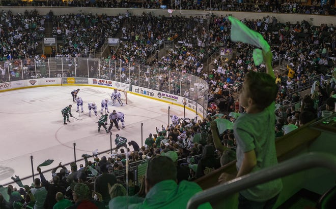 A sell out crowd of 6,863 Texas Stars fans cheer for a face off during game 4 of the Calder Cup Finals in Cedar Park, Thursday, June 7, 2018. [Stephen Spillman / for American-Statesman]