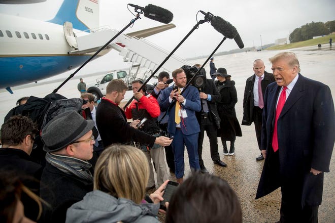 President Donald Trump speaks to reporters about a shooting at a Pittsburgh synagogue as he arrives at Air Force One at Andrews Air Force Base, Md., Saturday, Oct. 27, 2018, to travel to Indianapolis to speak at the 91st Annual Future Farmers of America Convention and Expo. (AP Photo/Andrew Harnik)