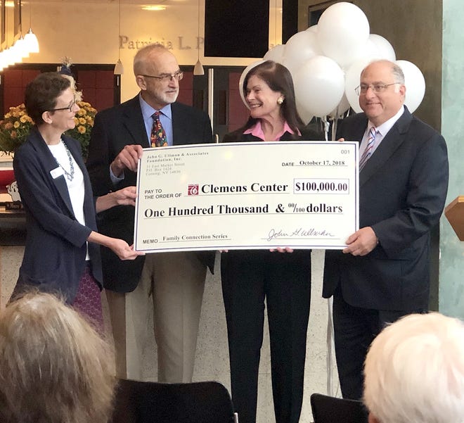 From left, Clemens Center Executive Director Karen Cromer, Dr. Bob Cole, Bobbie Ullman and John Ullman make the check presentation to the Clemens Center. [PROVIDED]