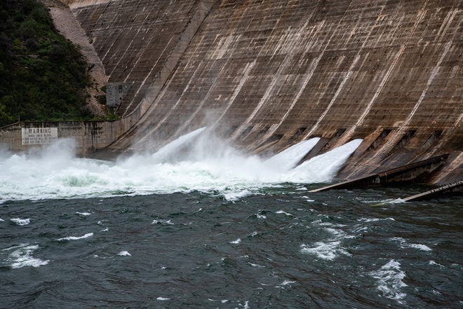 Floodgates at Mansfield Dam are expected to begin closing on Thursday as floodwaters begin to subside in Central Texas and the Hill Country. [SERGIO FLORES FOR AMERICAN-STATESMAN]