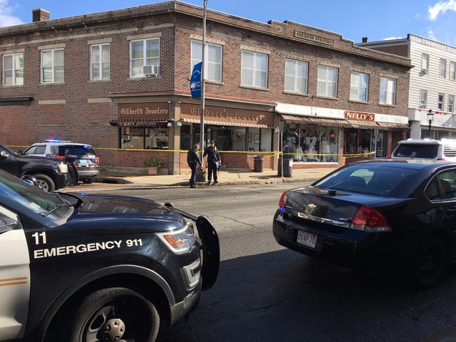Gilbert's Jewelers, 1370 Pleasant St., was cordoned off by police following a shooting in the area Monday morning. [Deborah Allard]