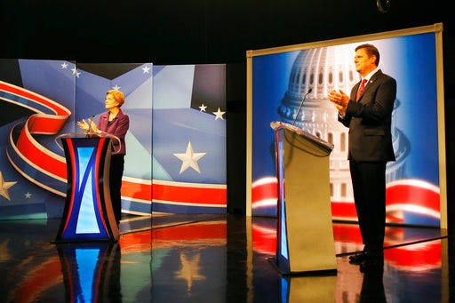 Sen. Elizabeth Warren and candidate Geoff Diehl engage in a political debate hosted at WCVB studios in Needham, Mass., Tuesday, Oct. 30, 2018. (Michael Swensen/The Boston Globe via AP, Pool)