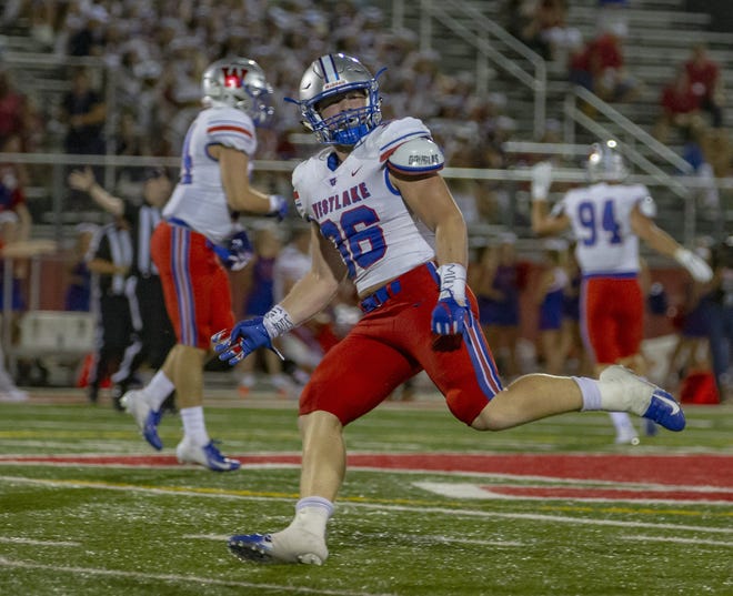 Westlake linebacker Jake Ehlinger reacts after recovering a Belton fumble during the Chaps' 38-17 win to start the year. Ehlinger leads the 7-1 Chaps with 52 tackles. [John Gutierrez/for American-Statesman]