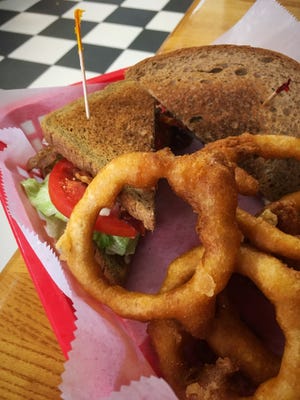Bacon, lettuce and tomato sandwich with onion rings at Joshua's Kitchen in Mulberry. [ERIC PERA/THE LEDGER]