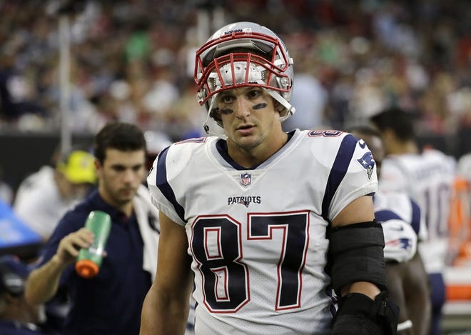 New England Patriots tight end Rob Gronkowski (87) on the sideline during an NFL football preseason game against the Houston Texans Saturday, Aug. 19, 2017, in Houston.