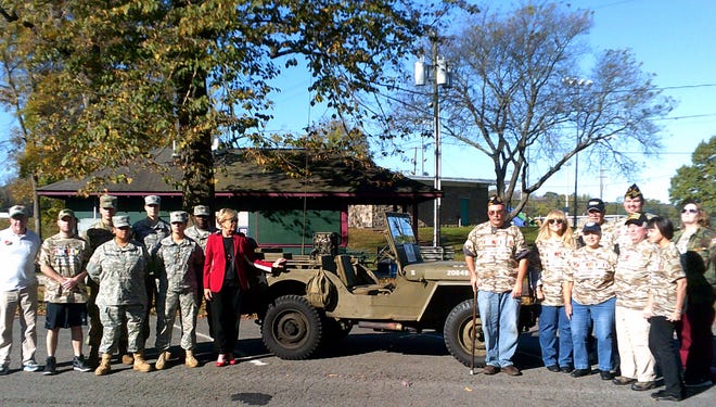 Members of the Monroe County Veteran's Association, ESU students, ROTC program, and president Marcia Welsh and member of Red Ball Express, Jim Siglin were in Dansbury Park to promote the Veterans' Day parade in 2017. Pictured in back row from left are: CDT David Santos, CDT Shannon Conrey and CDT Junior Sesay. Front row from left: Redball Military Transport member, Jim Siglin; ESU student, Paul Reinhart; CDT Jasmine Melendez; CDT Rosie Carrillo; and ESU President Dr. Marcia Welsh.

Monroe County Veteran's Association members in back row from left are: Bob Steltz, Matt DeAngelo, Christina Leon. Front row from left: Andy Sterner, Diana Badillo, Cookie Clampet, Joe Clampet, June Pepe.

[Photo provided]