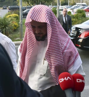 Saudi Arabia's top prosecutor Saud al-Mojeb walks to board a plane to leave Turkey, in Istanbul, Wednesday, Oct, 31, 2018. A top Turkish prosecutor said Wednesday that Saudi journalist Jamal Khashoggi was strangled as soon as he entered the Saudi Consulate in Istanbul as part of a premeditated killing, and that his body was dismembered before being disposed of. A statement from chief Istanbul prosecutor Irfan Fidan's office also said that discussions with Saudi chief prosecutor Saud al-Mojeb have yielded no "concrete results" despite "good-willed efforts" by Turkey to uncover the truth.(DHA via AP)