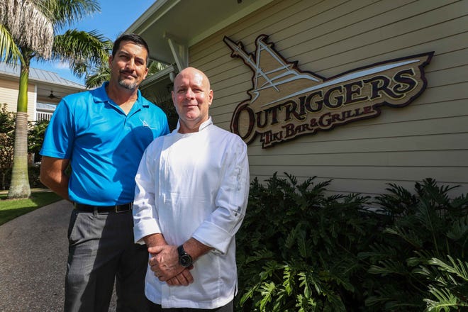 New Executive Chef Charlie DiBella (at right) and new General Manager Jim Rushing will be the forces behind big changes coming to Outriggers Tiki Bar & Grille in New Smyrna Beach. "We’re not going to change the view,” Rushing said, "but we’re going to change almost everything else.” [News-Journal/Lola Gomez]