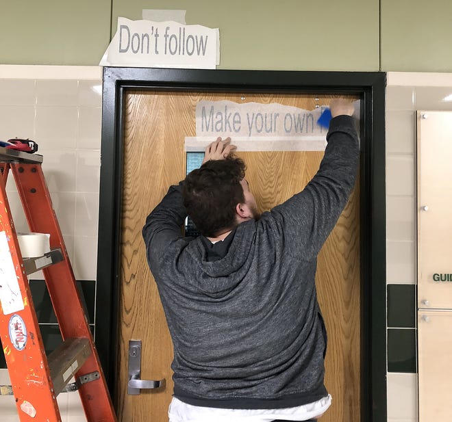 Advanced Placement art students at Herkimer High School have been displaying positive quotes throughout the school as part of a community service and real world experience through a vinyl process. [PHOTO COURTESY HEATHER MCCUTCHEON]