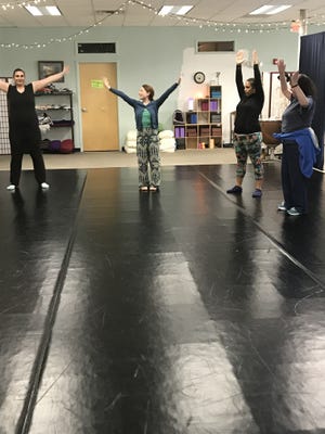Jessica Howard, director of the Heron Dance Yoga & Meditation Studio, teaches a class in the studio at 187 Plymouth Ave. [Submitted]