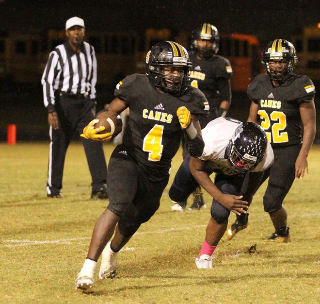 Pamlico County's Jarqez Jones runs the football in Friday's game versus Riverside (Martin). Pamlico County won the game 36-19. [Gray Whitley / Sun Journal Staff]