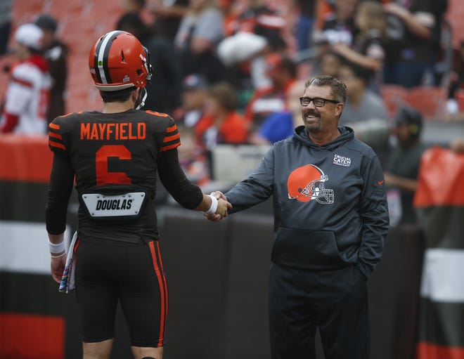 Browns quarterback Baker Mayfield (6) talks with defensive coordinator Gregg Williams before a game against the Baltimore Ravens last month. (Ron Schwane/Associated Press]