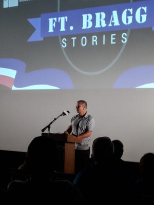 Ivan Castro speaks at the Fort Bragg Stories live storytelling event at the Airborne & Special Operations Museum on Aug. 18. [Elizabeth Friend/Special to the Observer]