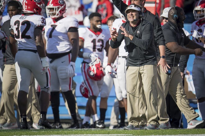 Georgia head coach directs players from the sideline during the second half an NCAA college football game against Kentucky in Lexington, Ky., Saturday, Nov. 3, 2018. (AP Photo/Bryan Woolston)
