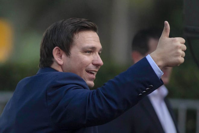 Republican Ron DeSantis speaks at a rally in Boca Raton on Sunday. DeSantis had support from former New York Mayor Rudy Giuliani and Florida Attorney General Pam Bondi as they tried to rally support for the governor race two days before Election Day. [JAMES WOOLDRIDGE/pbpost.com]