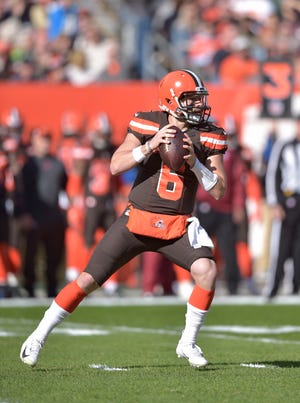 Browns quarterback Baker Mayfield looks to throw during the first half Sunday against the Kansas City Chiefs in Cleveland. [David Richard/Associated Press]