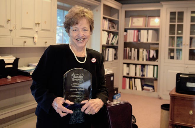 Beverly Haberle, executive director of The Council of Southeast Pennsylvania, with her lifetime achievement award from Faces and Voices of Recovery in Washington, DC. on Thursday, Sept. 27, 2018, in her Doylestown Township office. [KIM WEIMER / STAFF PHOTOJOURNALIST]