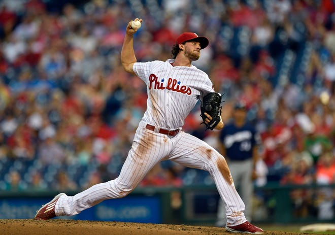 Philadelphia Phillies starting pitcher Aaron Nola throws during the third inning of a baseball game against the Milwaukee Brewers, Friday, July 21, 2017, in Philadelphia. (AP Photo/Derik Hamilton)