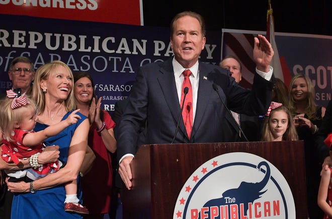 U.S. Rep. Vern Buchanan, District 16, is surrounded by family as he addresses the audience during an election party at the Hyatt Regency Sarasota on Tuesday evening. [Herald-Tribune staff photo / Dan Wagner]