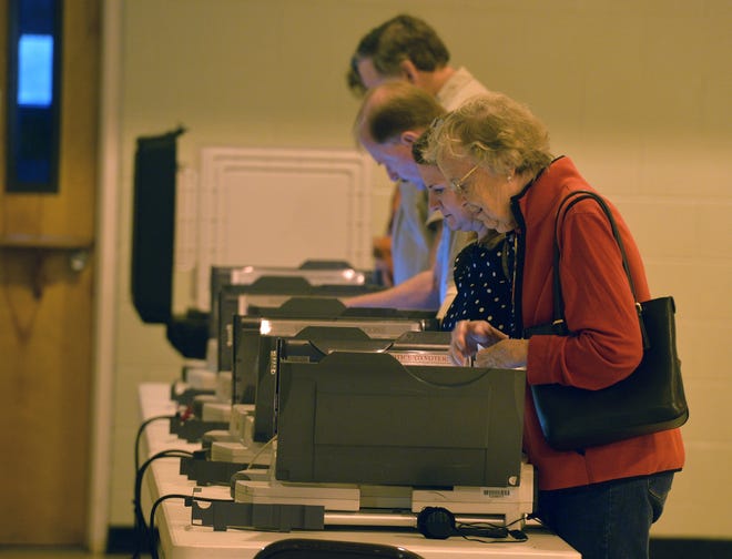Voters cast their ballots at Windsor Forest Baptist Church. [Steve Bisson/savannahnow.com]