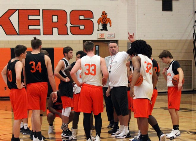 Kewanee coach Shaune Lewis talks with the Boilers during Monday's practice.