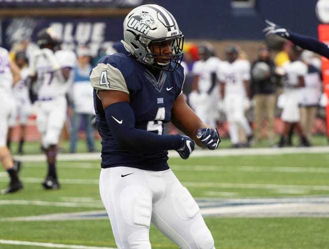 New Hampshire linebacker Quinlen Dean recorded eight tackles, had two sacks and forced a fumble in the Wildcats' 35-24 win over No. 3 James Madison last Saturday at Wildcat Stadium. [UNH ATHLETICS]