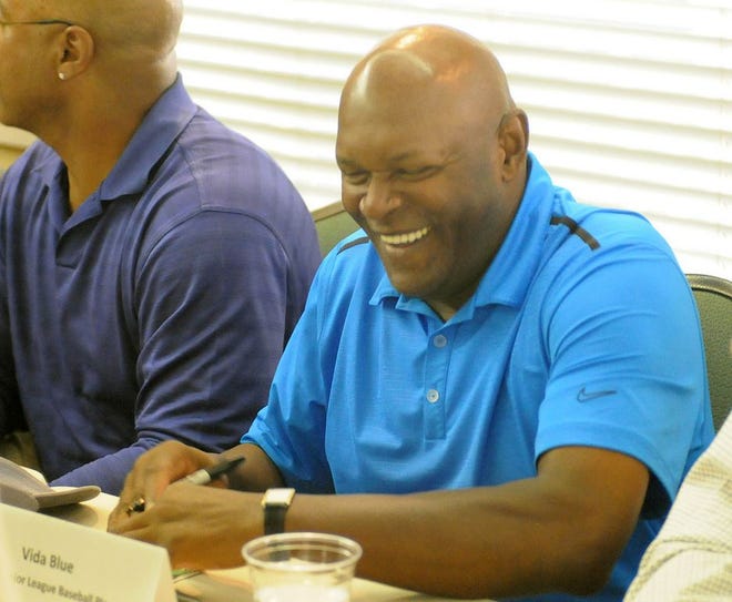Retired major league pitcher Vida Blue laughs during a sports legends and entertainers autograph session at the Landfall Park Hampton Inn & Suites in Wilmington Saturday, November 10, 2012. The event is part of the 10th Annual Willie Stargell Celebrity Golf Tournament, which raises money to fight kidney disease in honor of Willie Stargell who died of the disease in 2001.  Star News photo by Matt Born