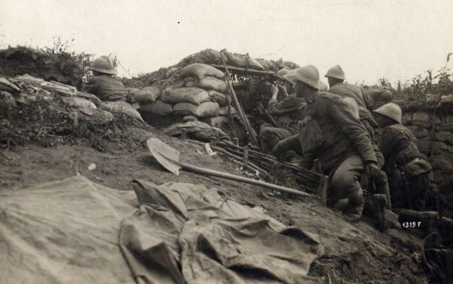 Italian troops on the alert. Italy's success against Austria helped knock the Austrians out of the war, further weakning Germany's military situation in late 1918. [COURTESY PHOTO]