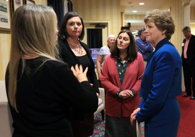 Sen. Jeanne Shaheen speaks with Testing for Pease co-founders Alayna Davis, from left, and Andrea Amico and Laurene Allen of Merrimack Citizens for Clean Water during the 2018 NHMS Annual Scientific Conference at Wentworth by the Sea Hotel and Spa on Friday night.
[Ioanna Raptis/Seacoastonline]