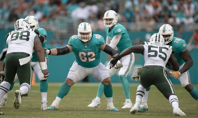 Miami Dolphins offensive guard Ted Larsen is probably not playing Sunday at Green Bay. [ALLEN EYESTONE/palmbeachpost.com]